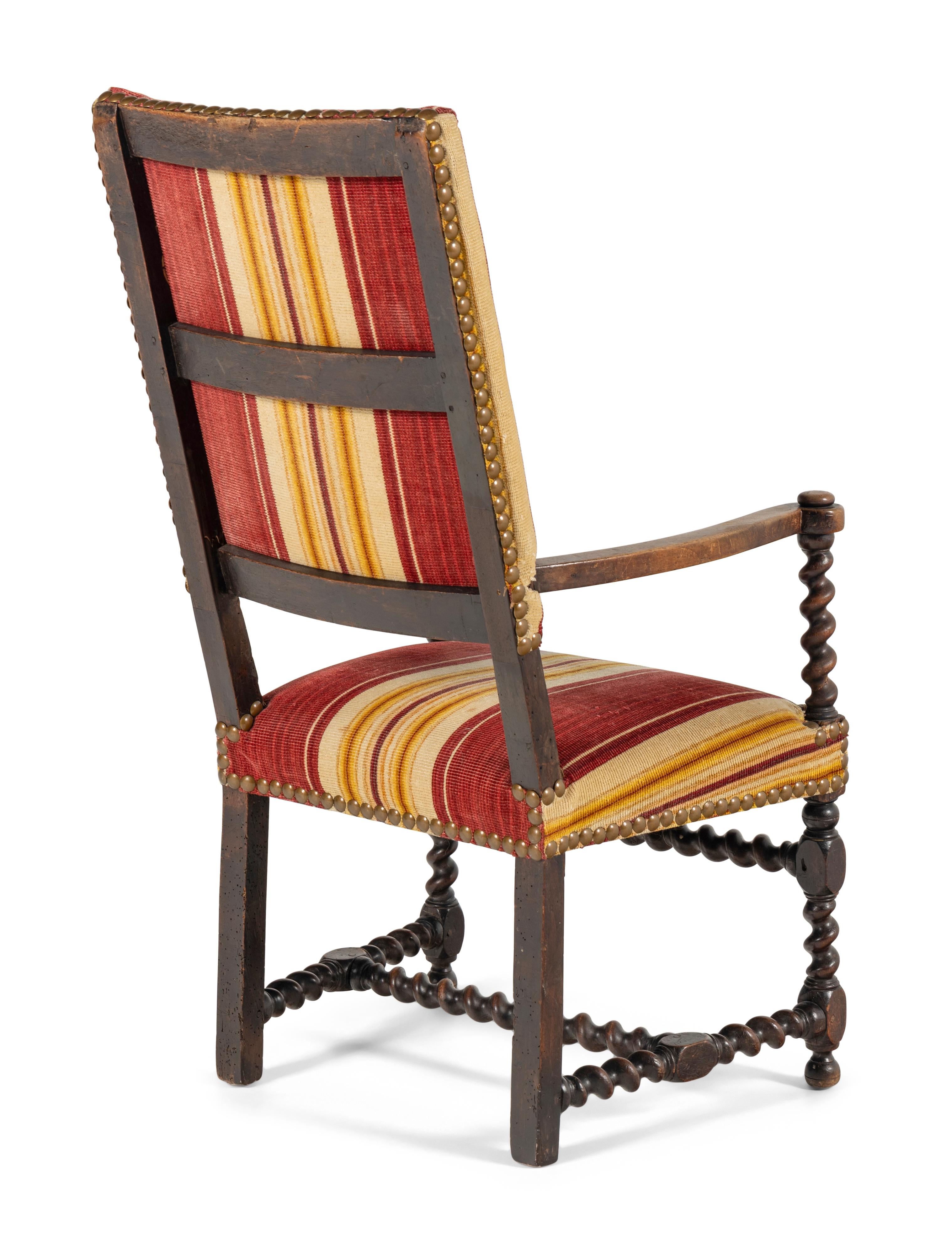 A William and Mary Style Carved Walnut Armchair