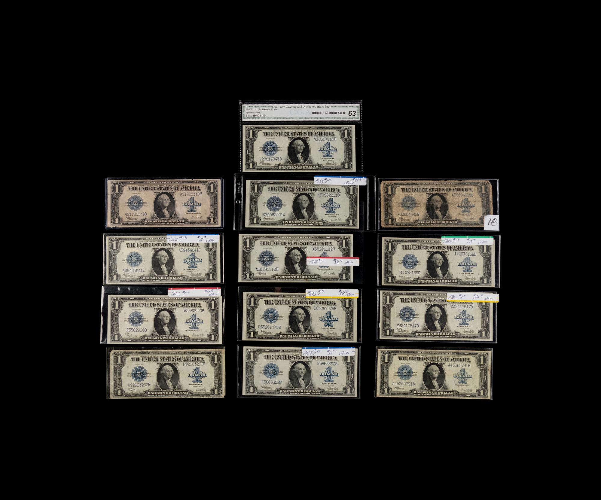 A Group of Thirteen Series 1923 $1 Silver Certificates