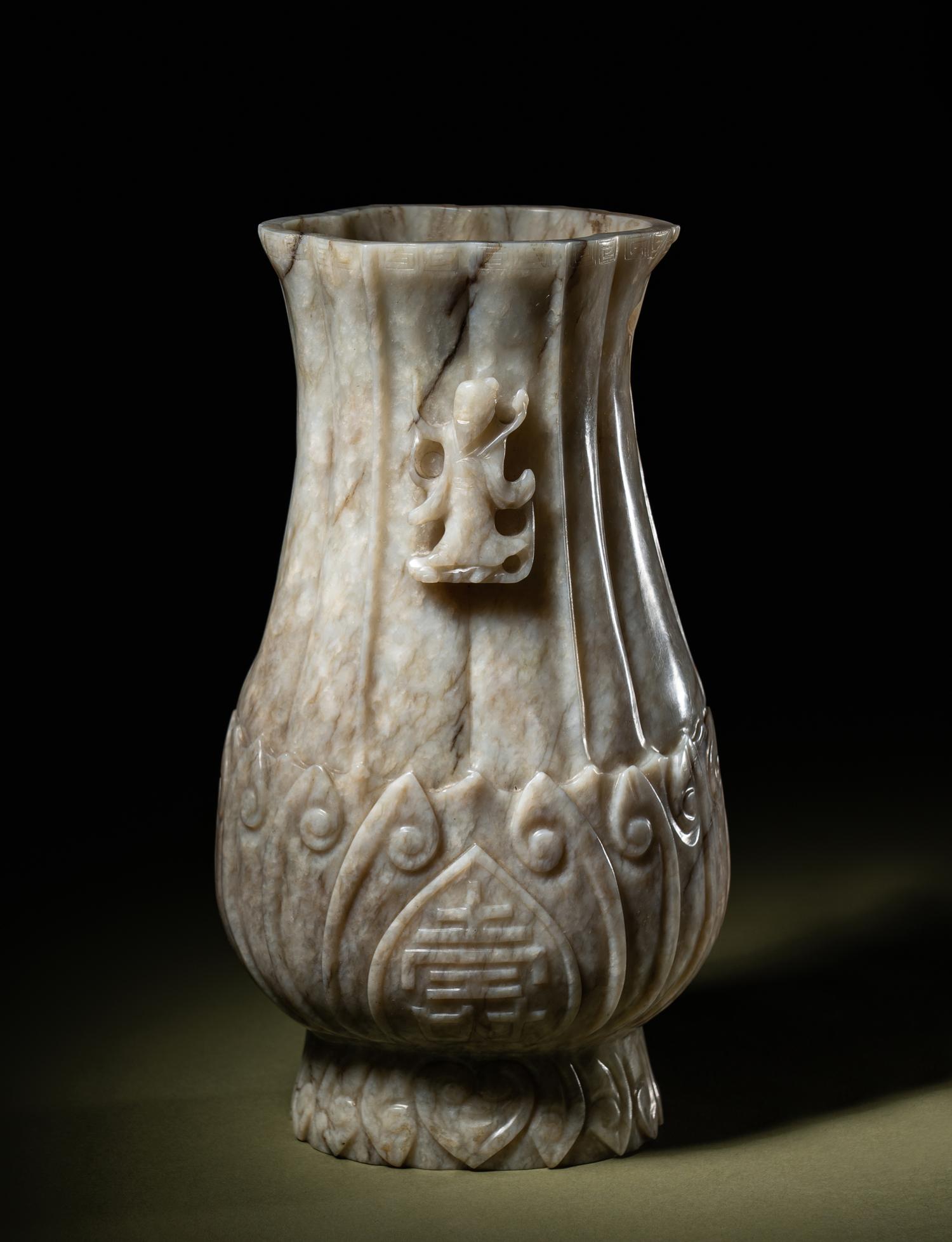 A Chicken Bone Jade 'Lotus' Vase
