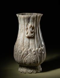 A Chicken Bone Jade 'Lotus' Vase