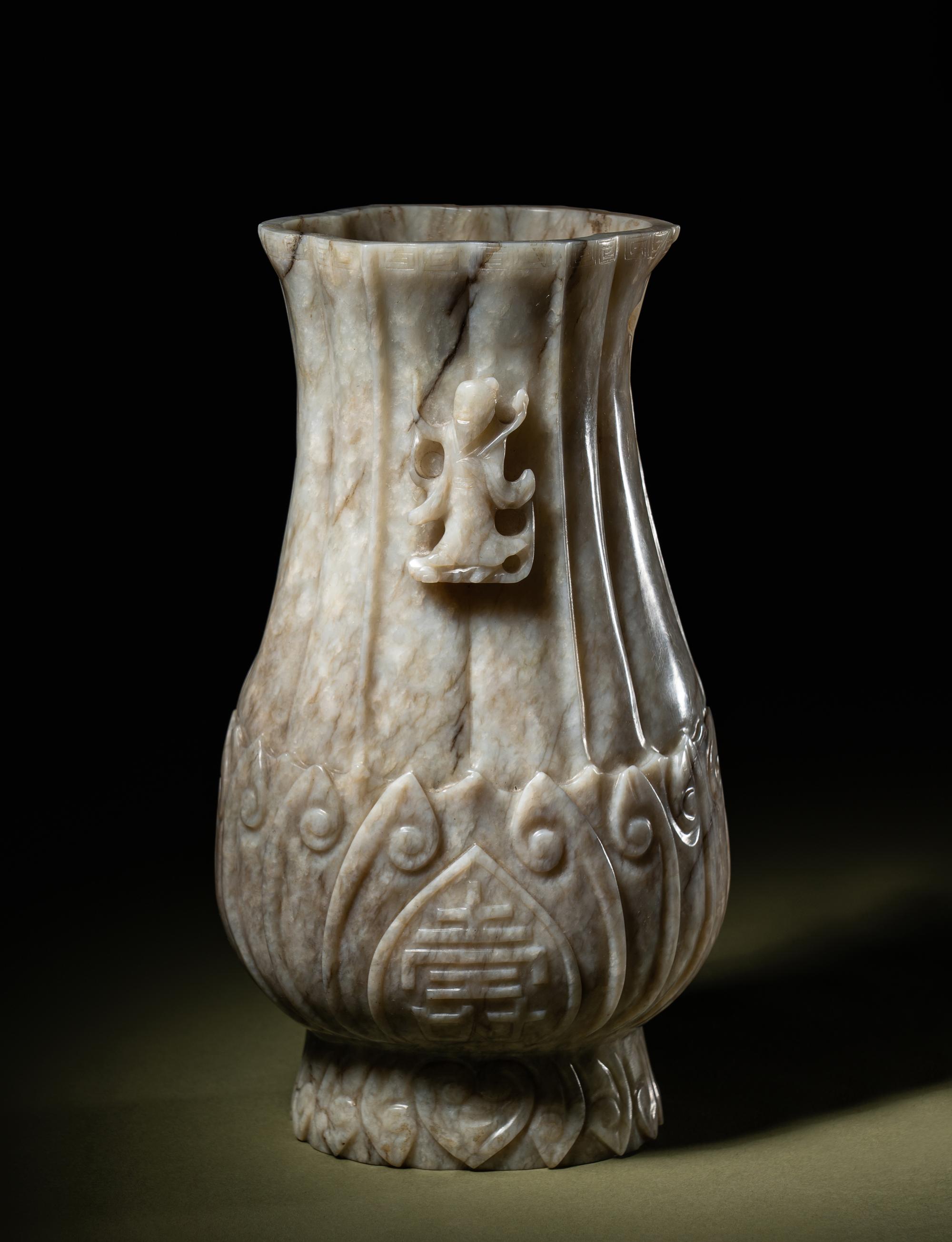 A Chicken Bone Jade 'Lotus' Vase