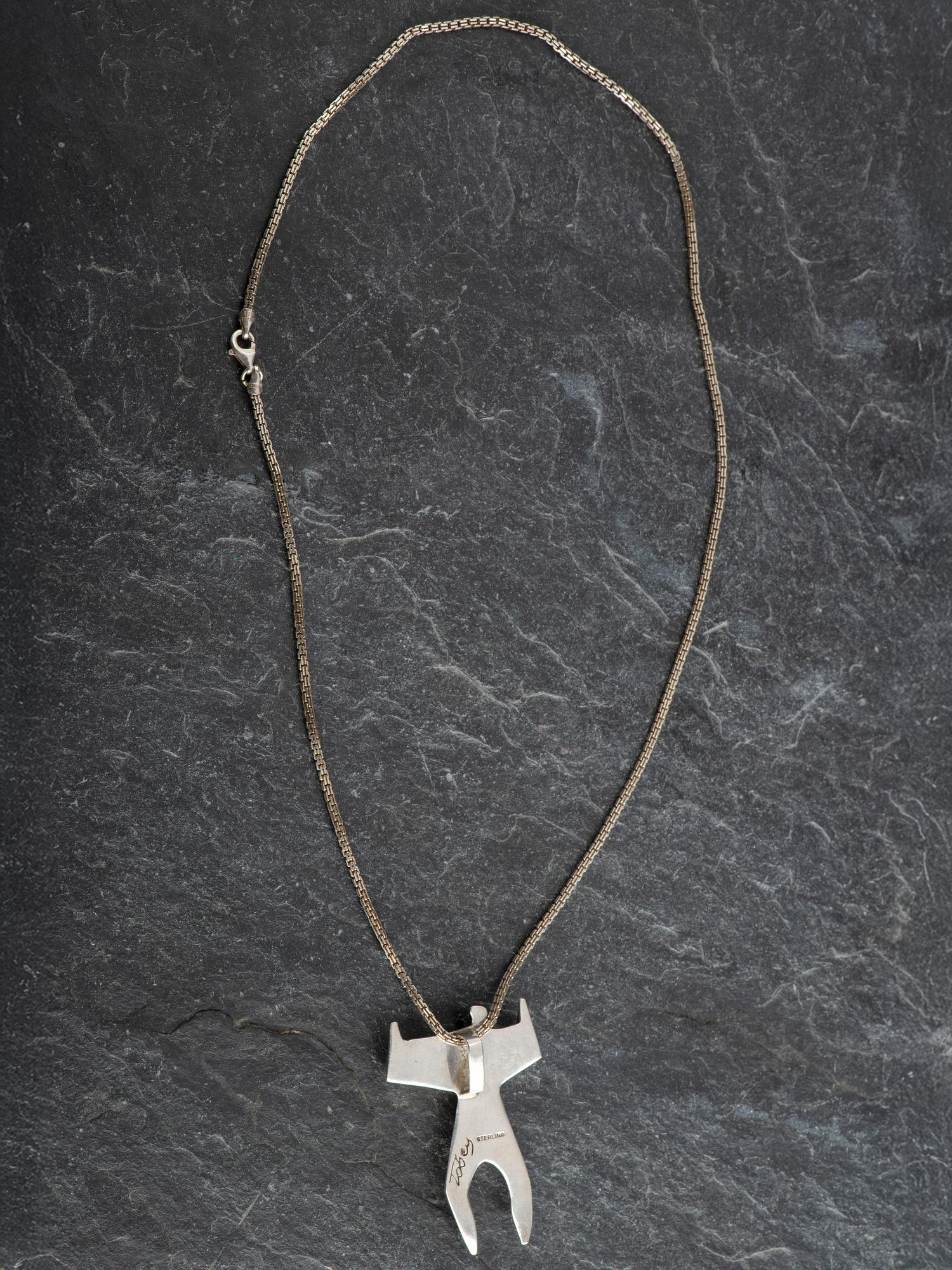 Sterling Silver and Inlay Figural Pendant