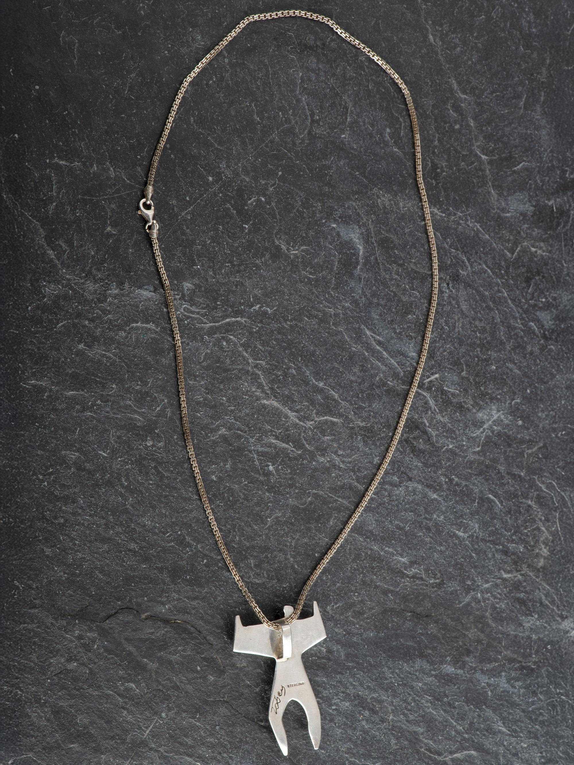 Sterling Silver and Inlay Figural Pendant