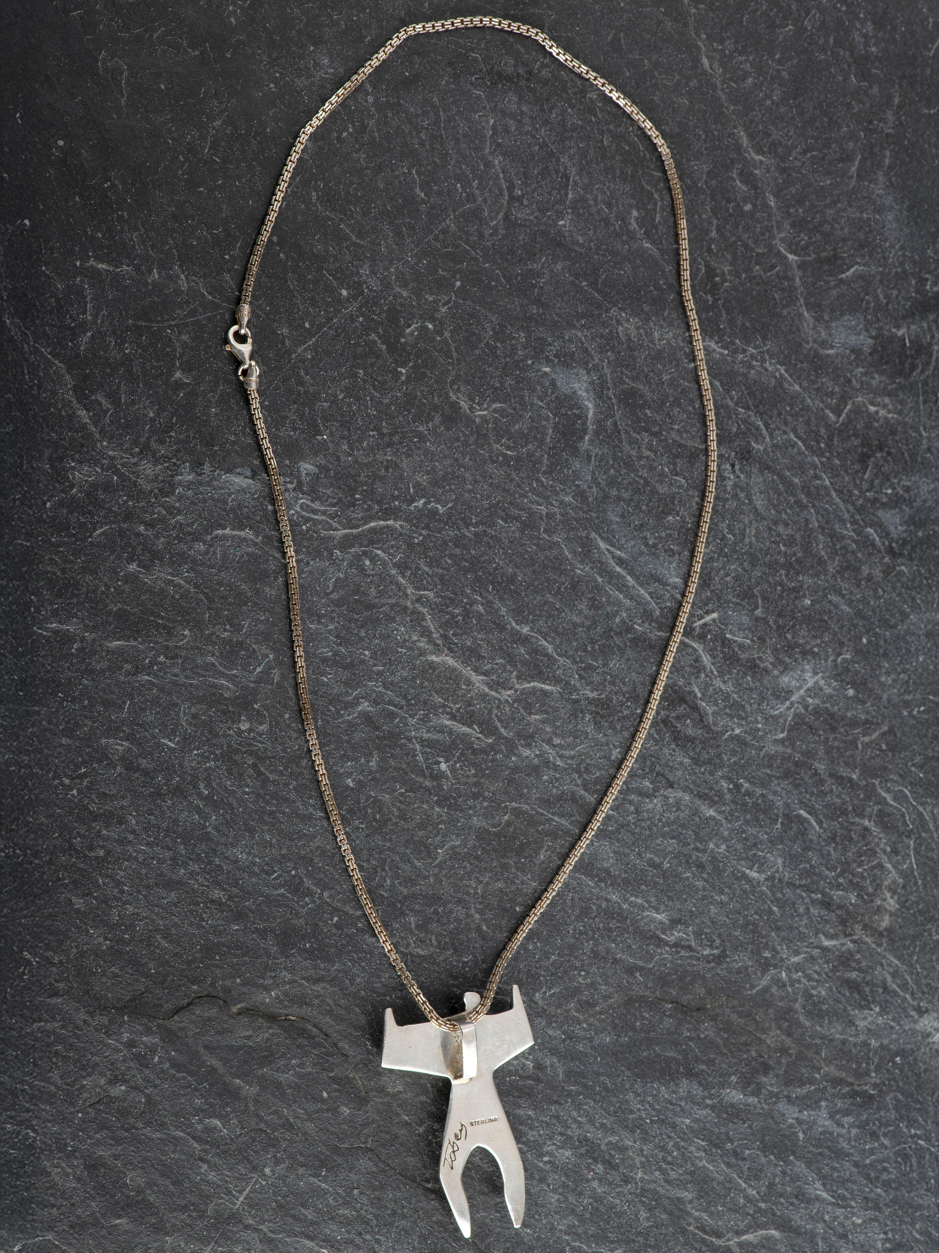 Sterling Silver and Inlay Figural Pendant