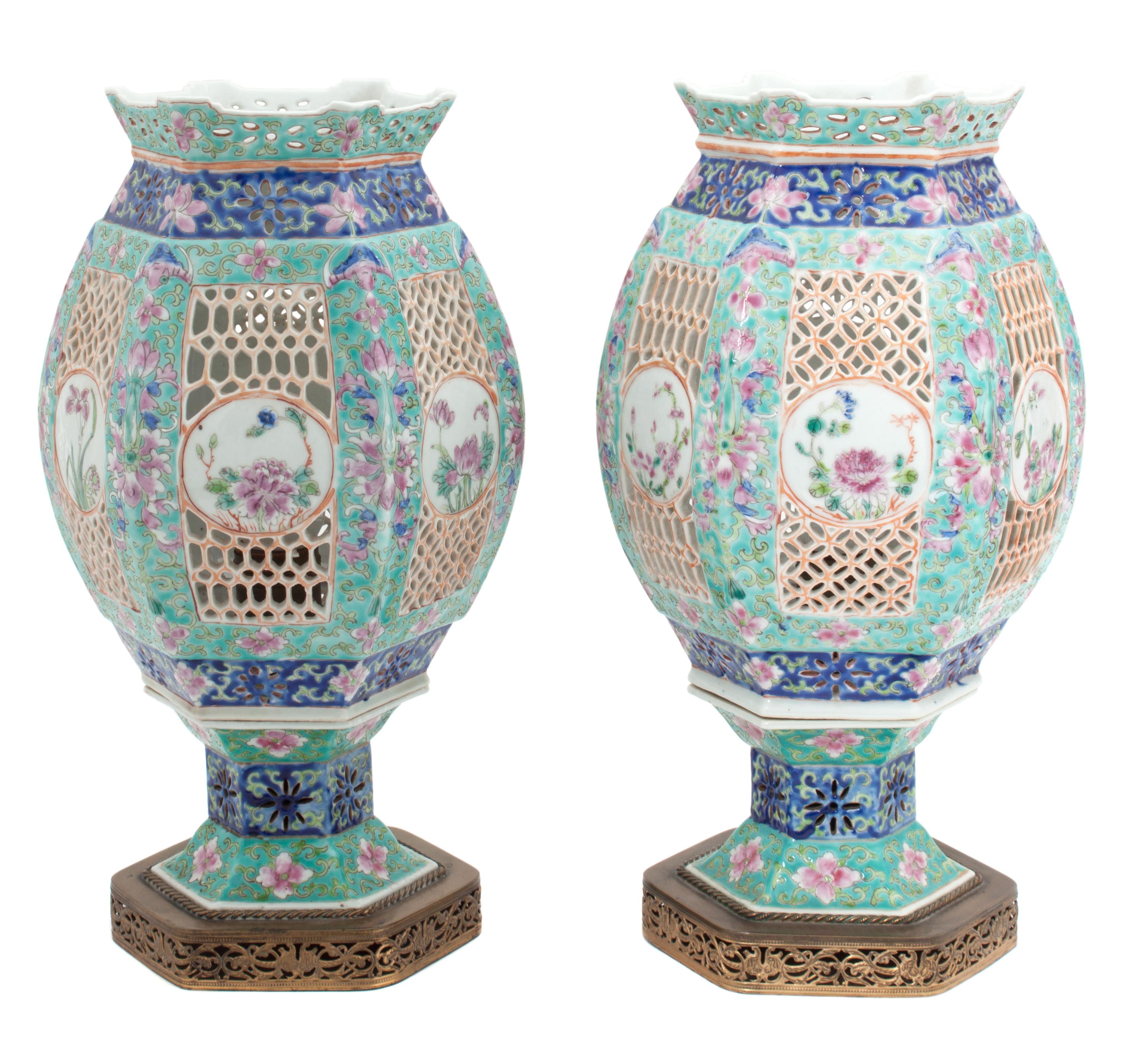 A Pair of Chinese Famille Rose Porcelain Reticulated Lanterns Height of each 12 1/2 inches. — EARLY 20TH CENTURY