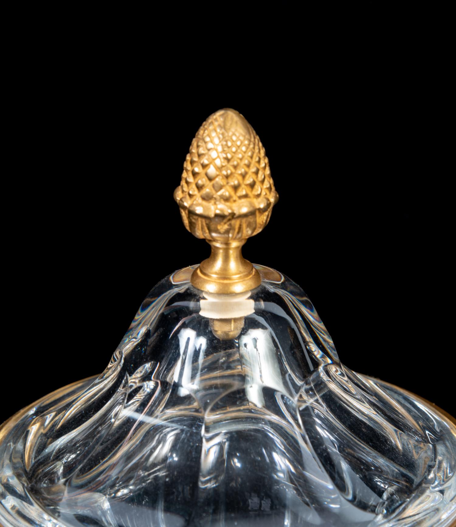 A Pair of Baccarat Gilt Metal Mounted Urns