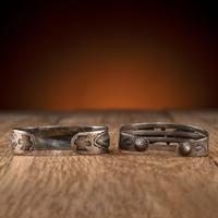Pair of Navajo Silver Cuff Bracelets, with Thunderbirds
