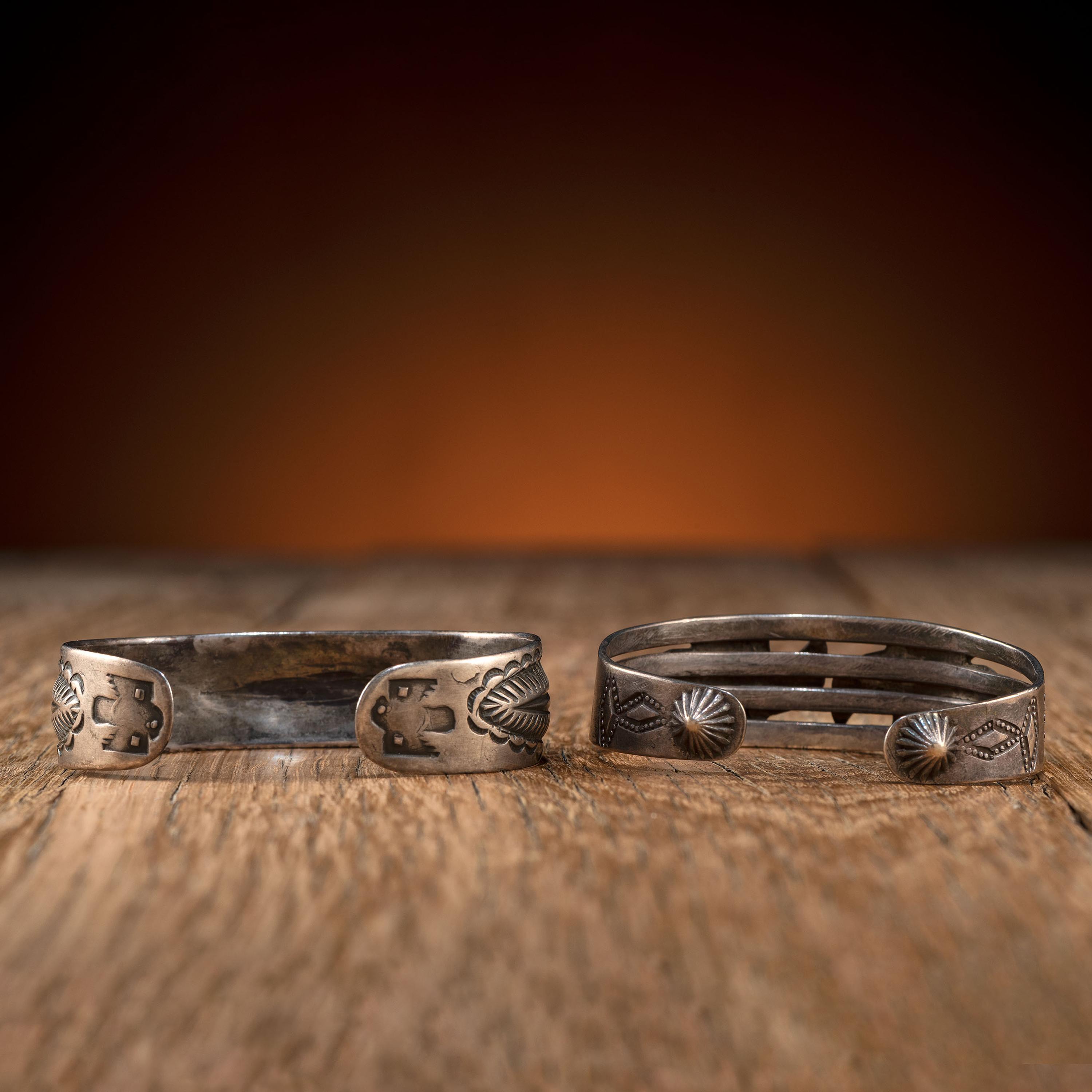 Pair of Navajo Silver Cuff Bracelets, with Thunderbirds