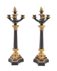 A Pair of Charles X Style Gilt and Patinated Bronze Four-Light Candelabra