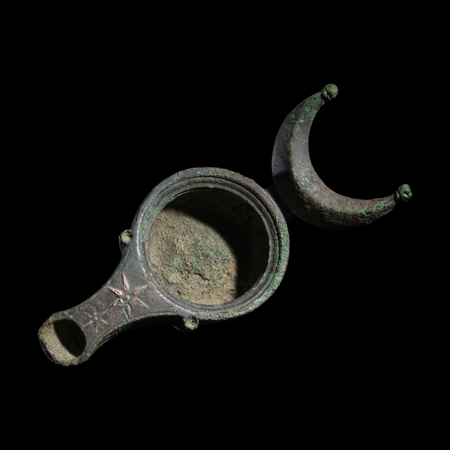 A Roman Bronze Oil Lamp