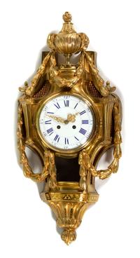 A Louis XV Style Gilt Bronze Cartel Clock