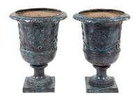 A Pair of Neoclassical Style Painted Cast Iron Planters Height 28 inches. — 20TH CENTURY