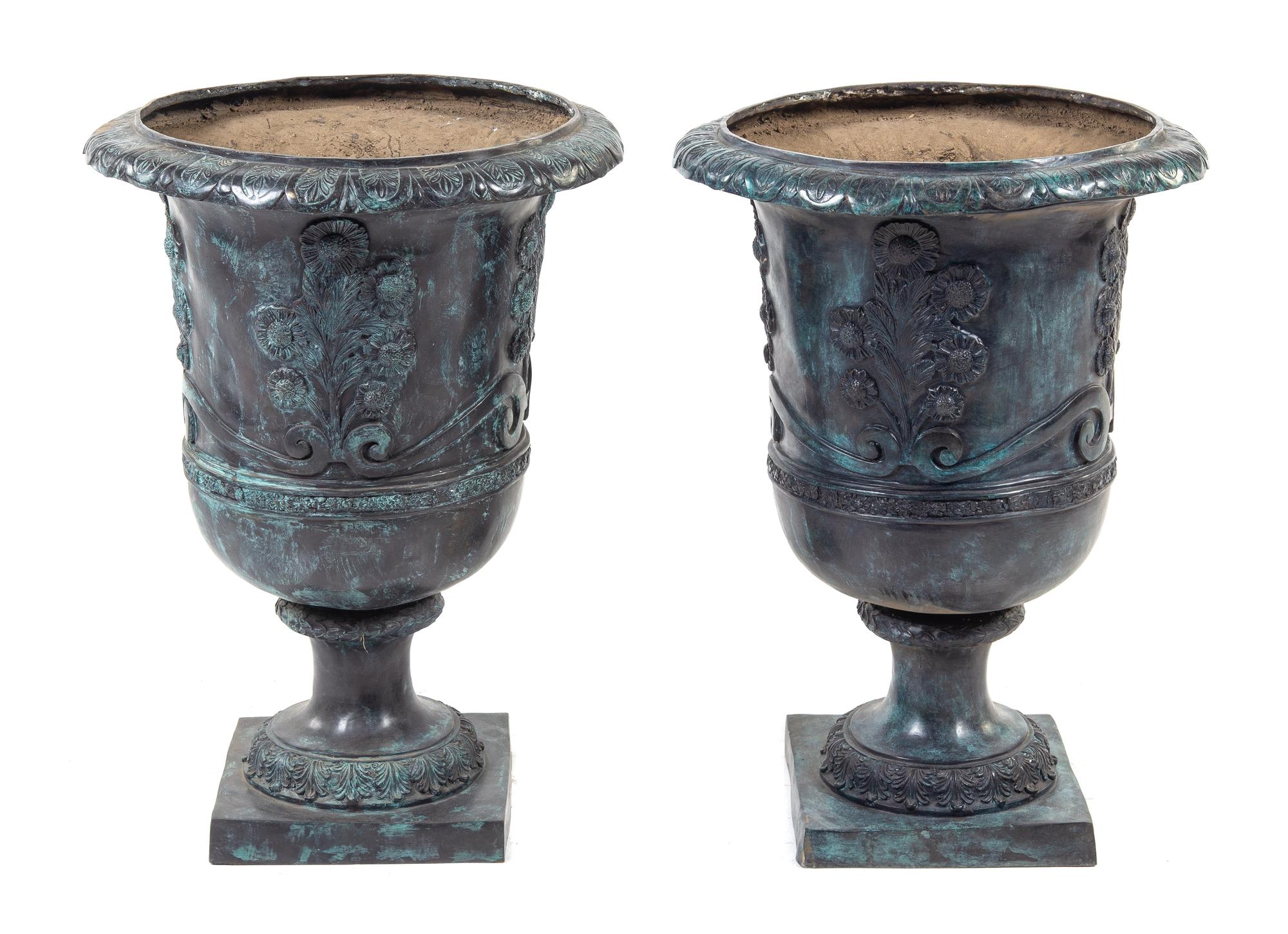 A Pair of Neoclassical Style Painted Cast Iron Planters Height 28 inches. — 20TH CENTURY