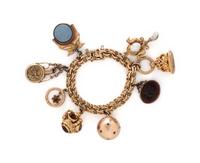 YELLOW GOLD CHARM BRACELET