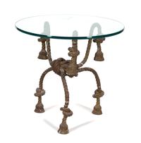 An Italian Gilt Metal Rope and Tassle Glass Top Table Height 29 1/2 x diameter 32 1/2 inches. — 20TH CENTURY