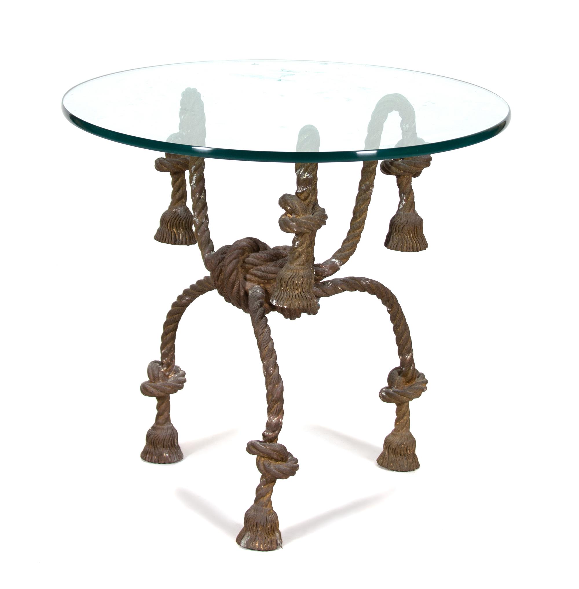 An Italian Gilt Metal Rope and Tassle Glass Top Table Height 29 1/2 x diameter 32 1/2 inches. — 20TH CENTURY