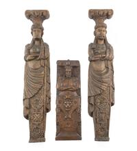 A Group of Three Carved Oak Figural Pilasters