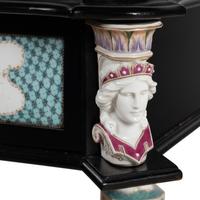 A German Ebonized and Porcelain Mounted Bureau