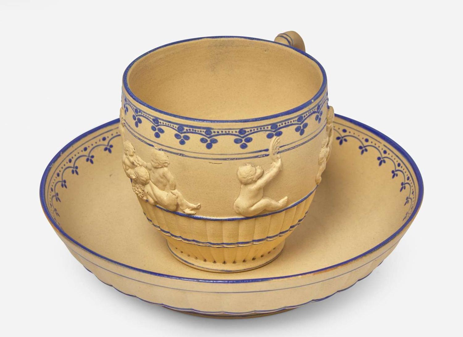 A Wedgwood Encaustic Decorated Caneware "Bacchanalian Boys" Cup and Saucer, UK, circa 1790