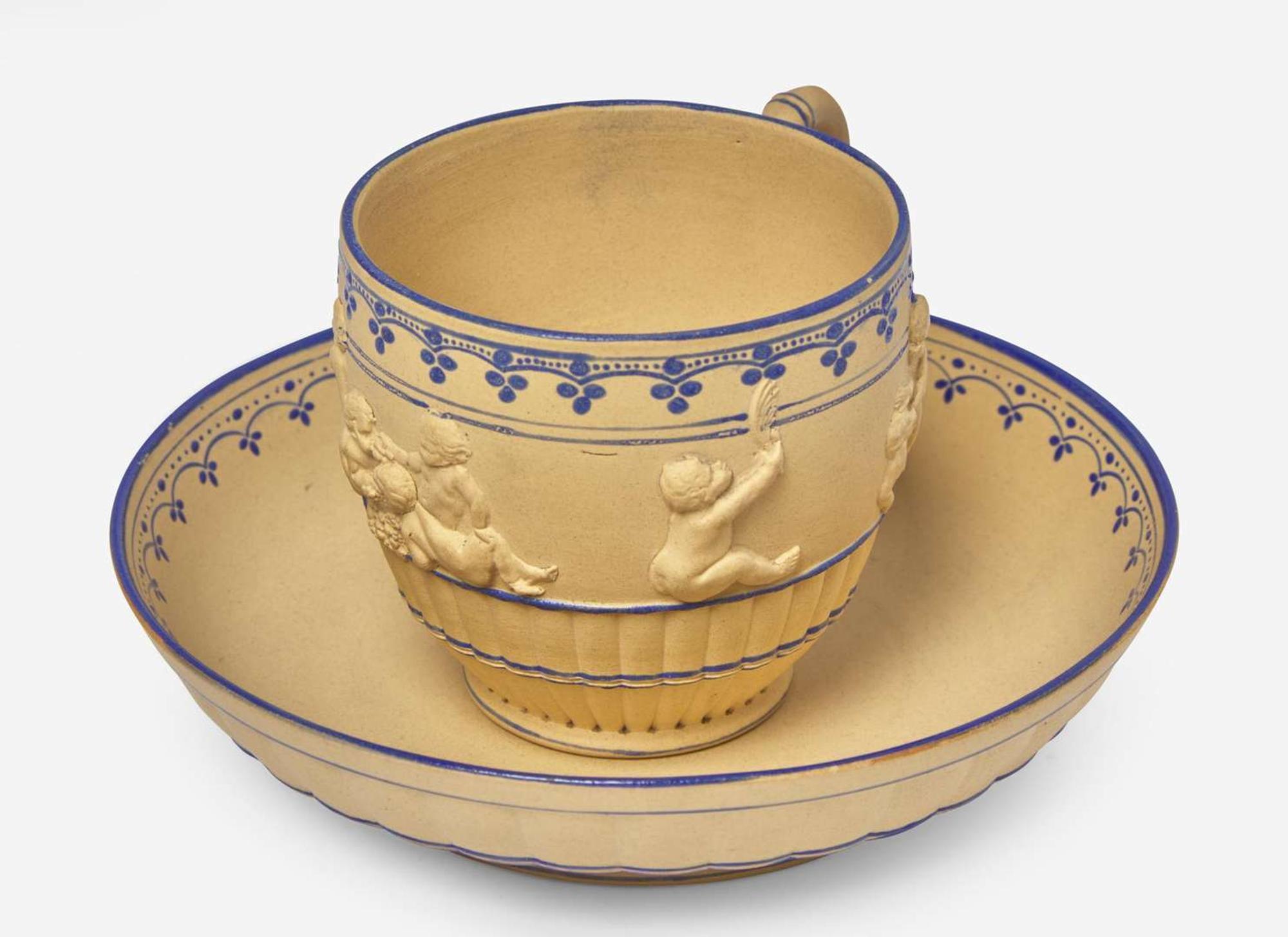 A Wedgwood Encaustic Decorated Caneware "Bacchanalian Boys" Cup and Saucer, UK, circa 1790