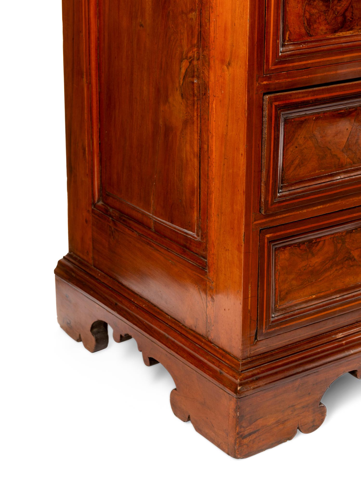 An Italian Walnut Chest of Drawers