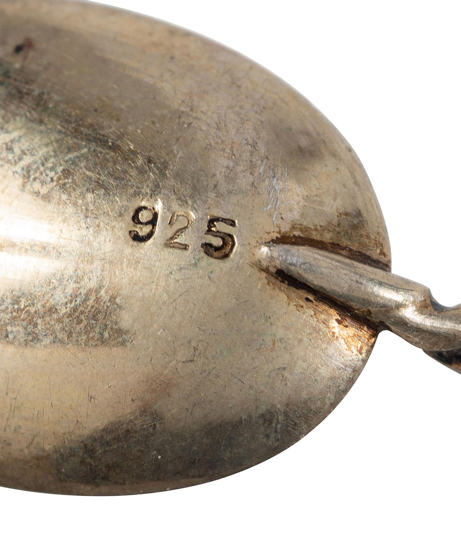 Twenty-Two Silver, Gilt and Enamel Souvenir and Serving Spoons and a Fork