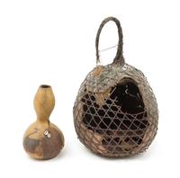 An African Gourd Basket Height 22 1/2 inches. — 19TH CENTURY