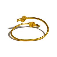 An Egyptian Gold Bracelet with Terminal Busts of the Goddess Isis