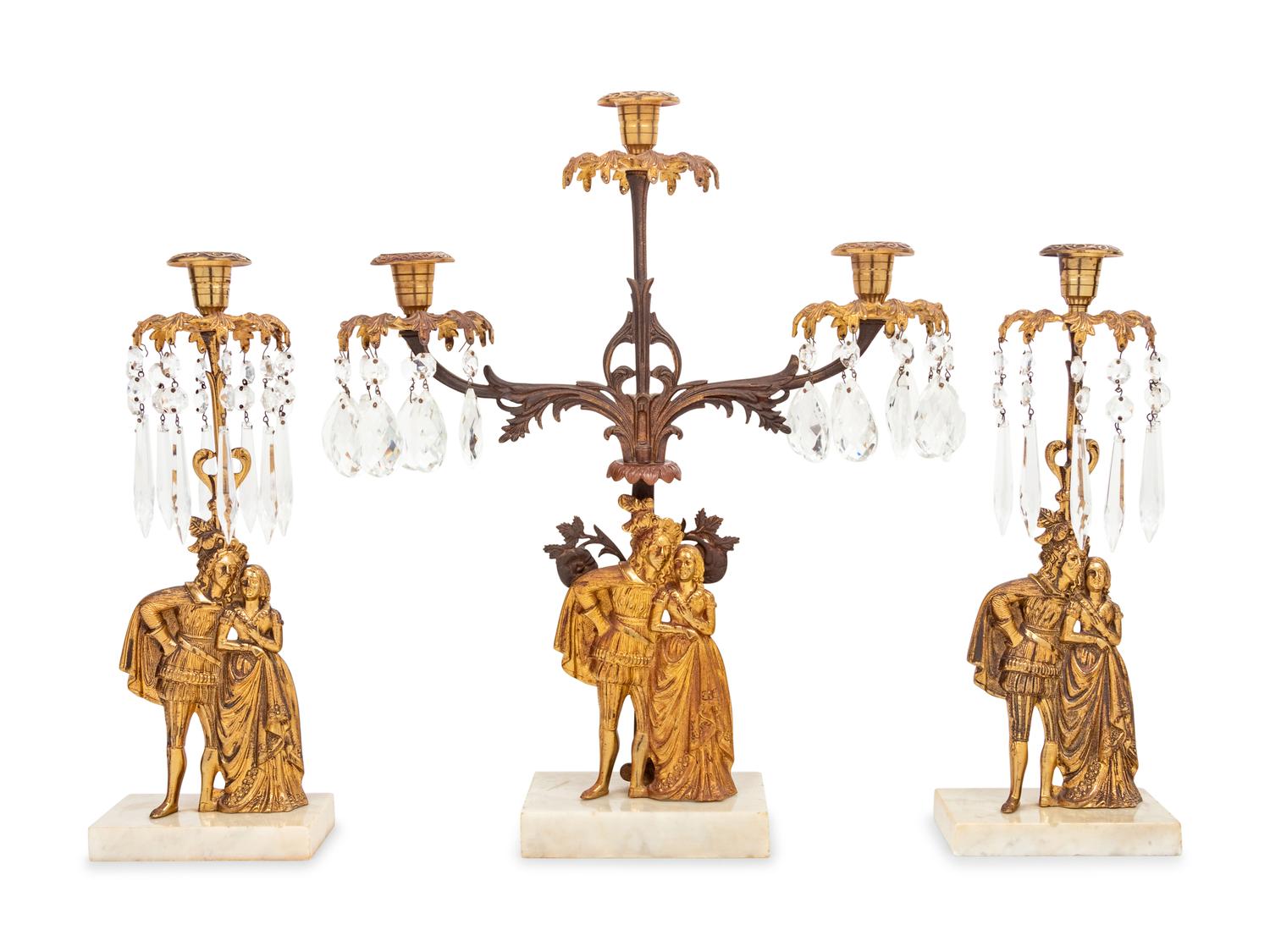 A Victorian Gilt Metal and Marble Three-Piece Garniture