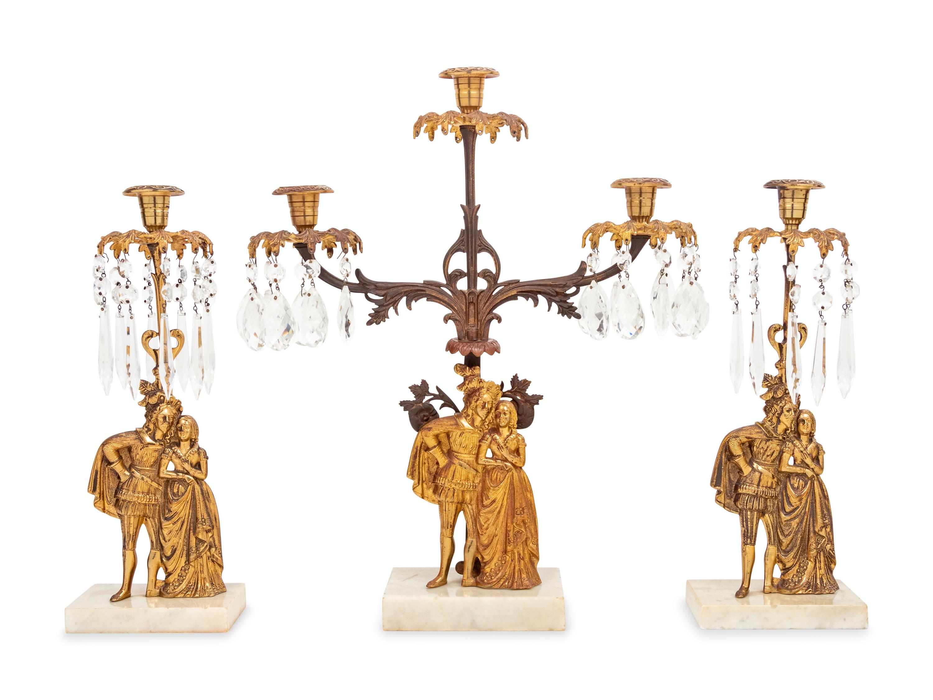 A Victorian Gilt Metal and Marble Three-Piece Garniture