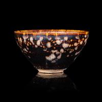 A Chinese Jizhou 'Papercut' Teabowl, Possibly Southern Song Dynasty 或為南宋 吉州窯貼花盞