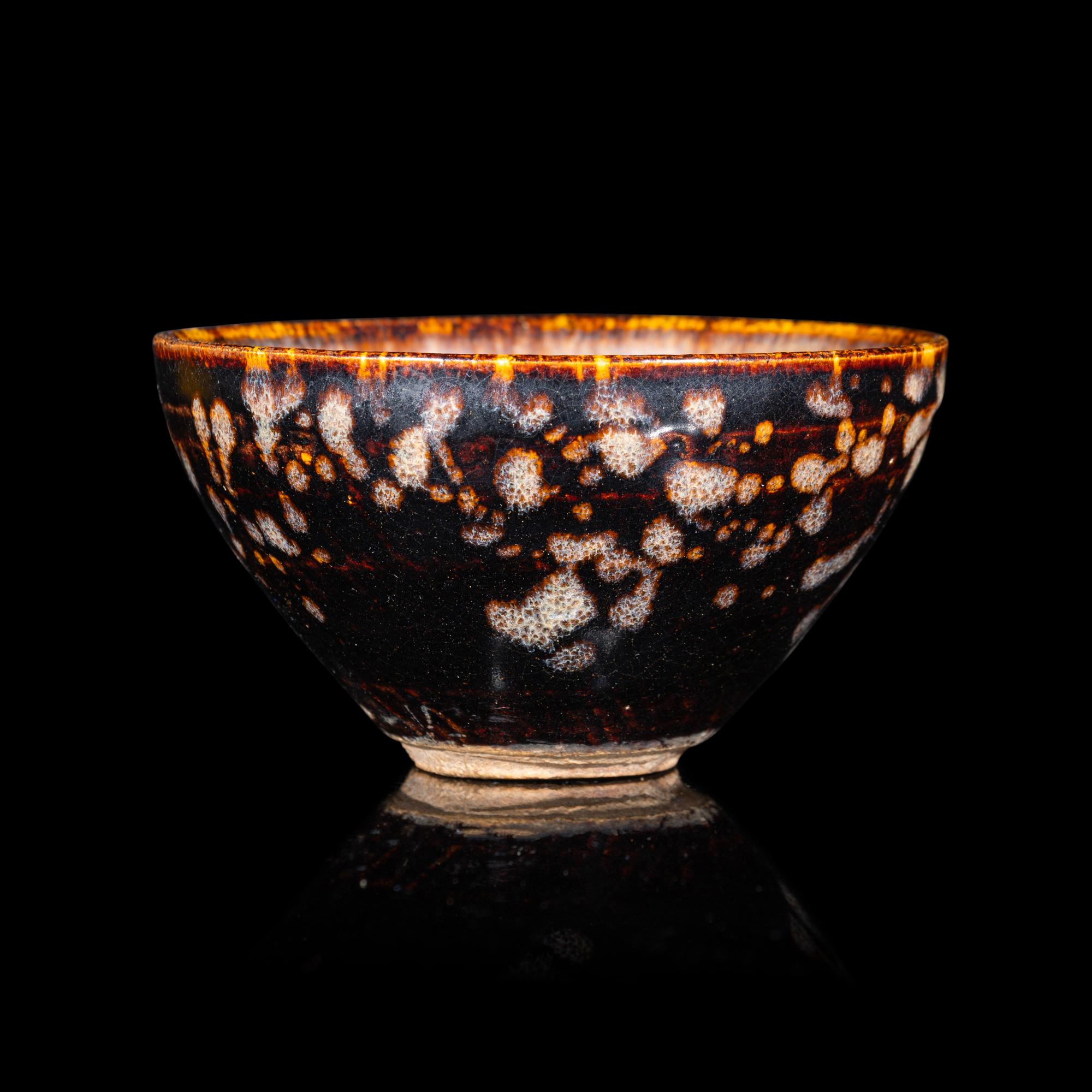 A Chinese Jizhou 'Papercut' Teabowl, Possibly Southern Song Dynasty 或為南宋 吉州窯貼花盞