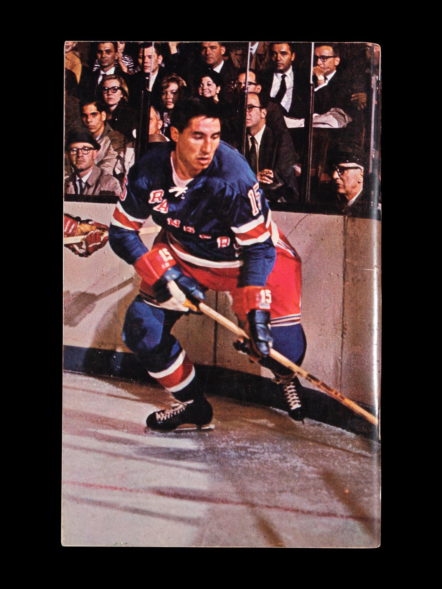 A Group of 16 1960s - 1980s New York Rangers Blue Book Media Guides,