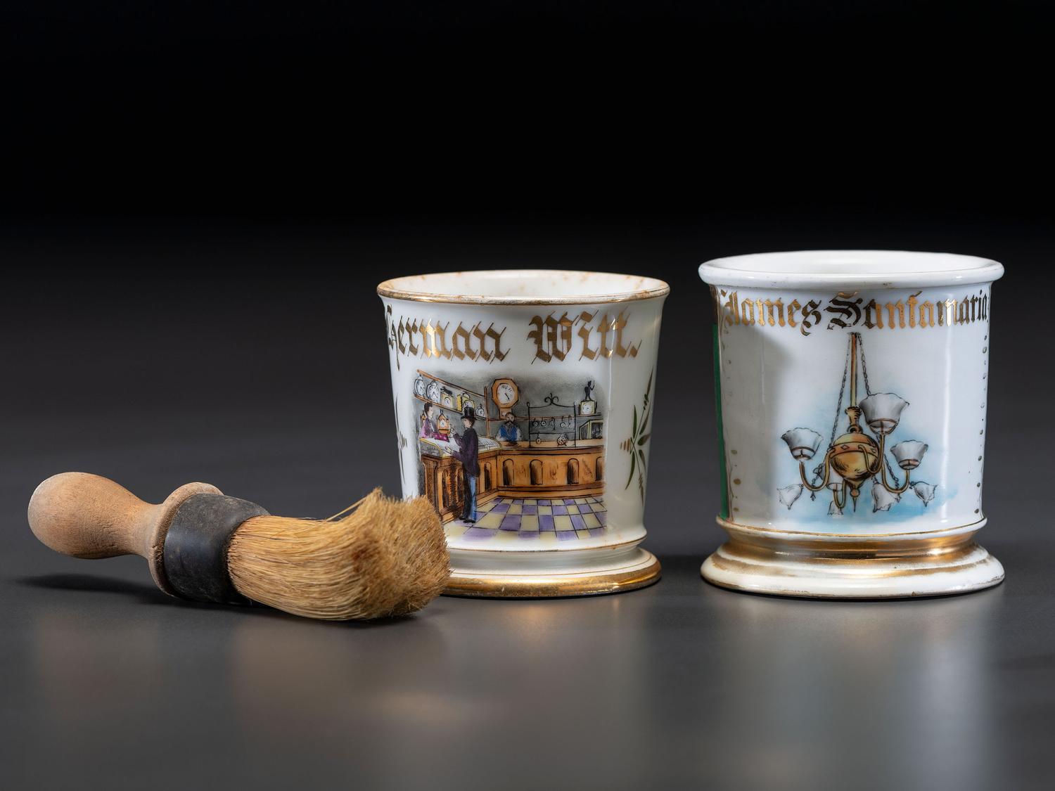 Two Retailer's Porcelain Occupational Shaving Mugs