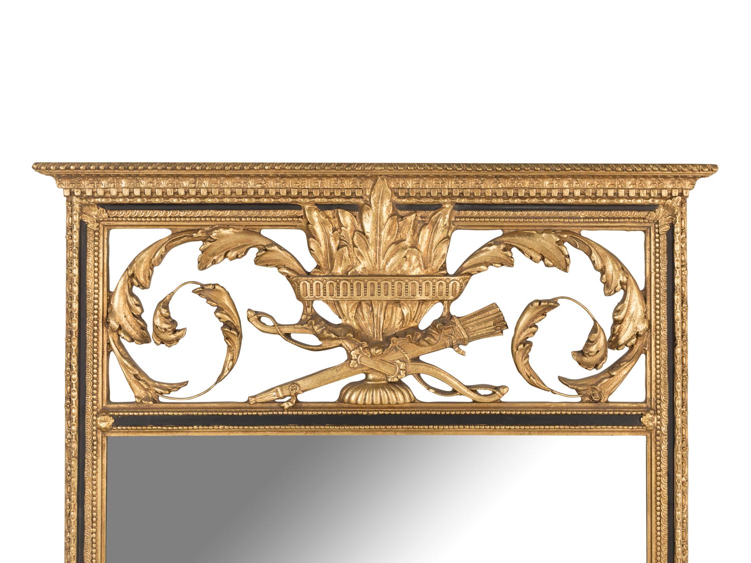 An Empire Style Giltwood and Parcel-Ebonized Mirror
