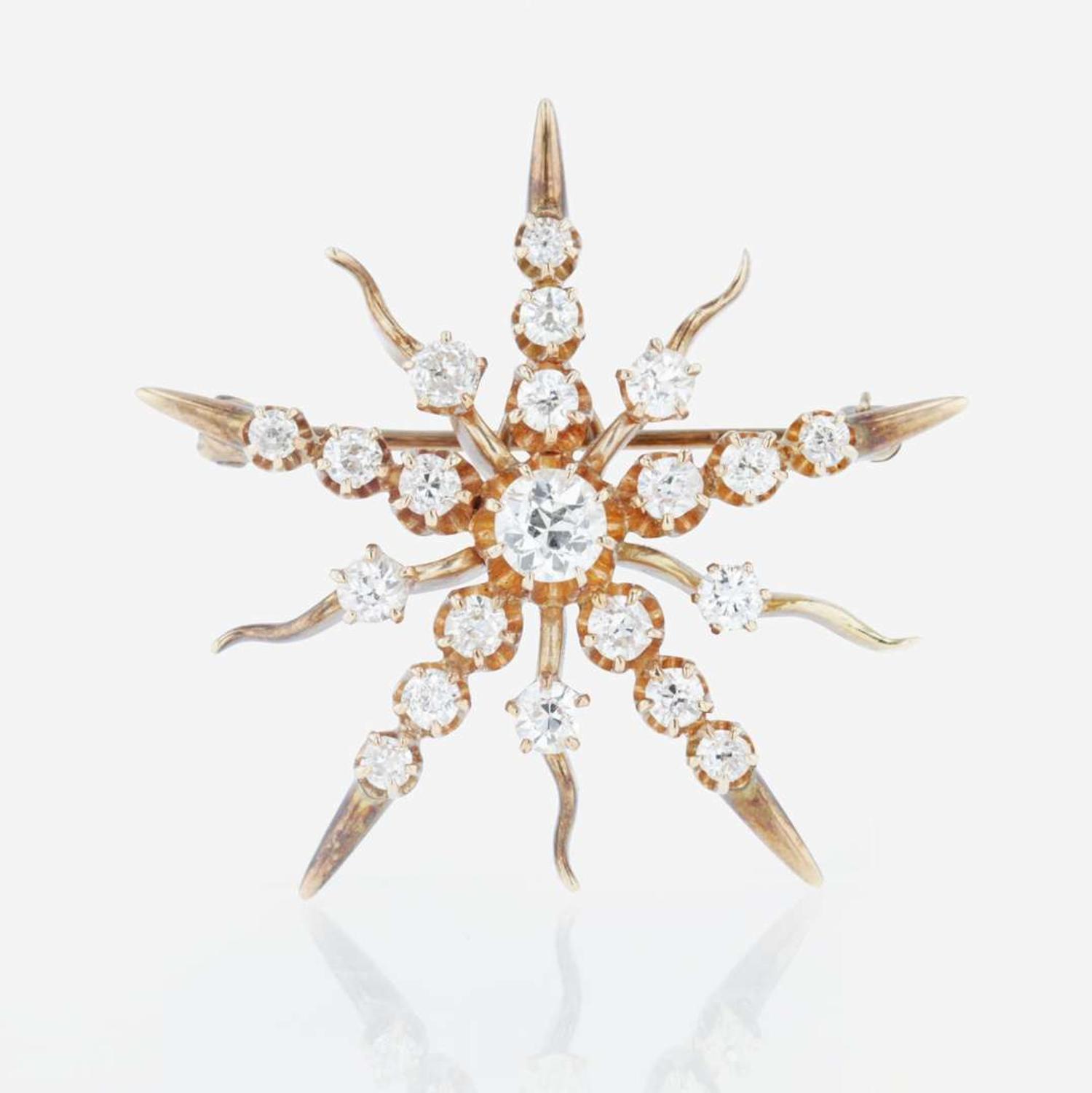 A 14K rose gold and diamond pendant/brooch