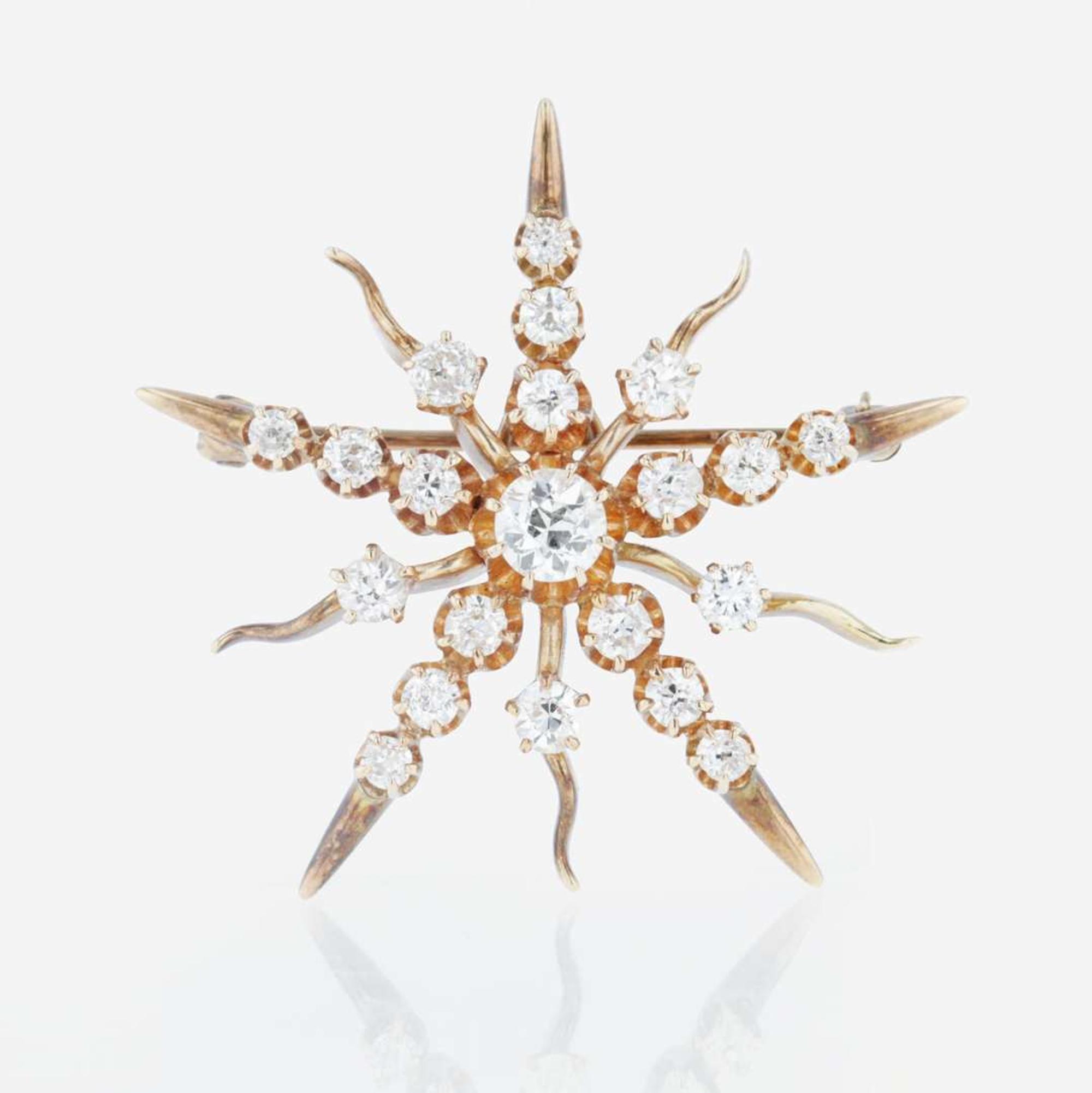A 14K rose gold and diamond pendant/brooch