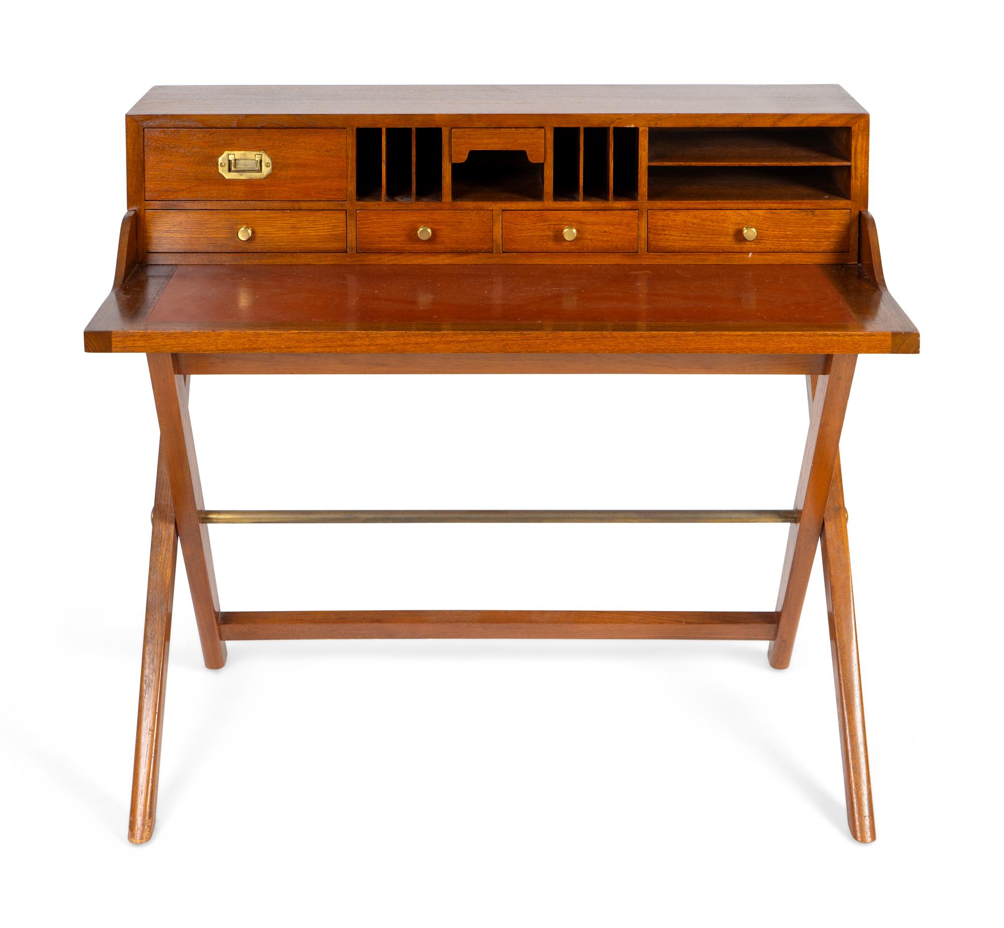 A Brass Mounted Teak Campaign Desk on X-Form Base — 20TH CENTURY