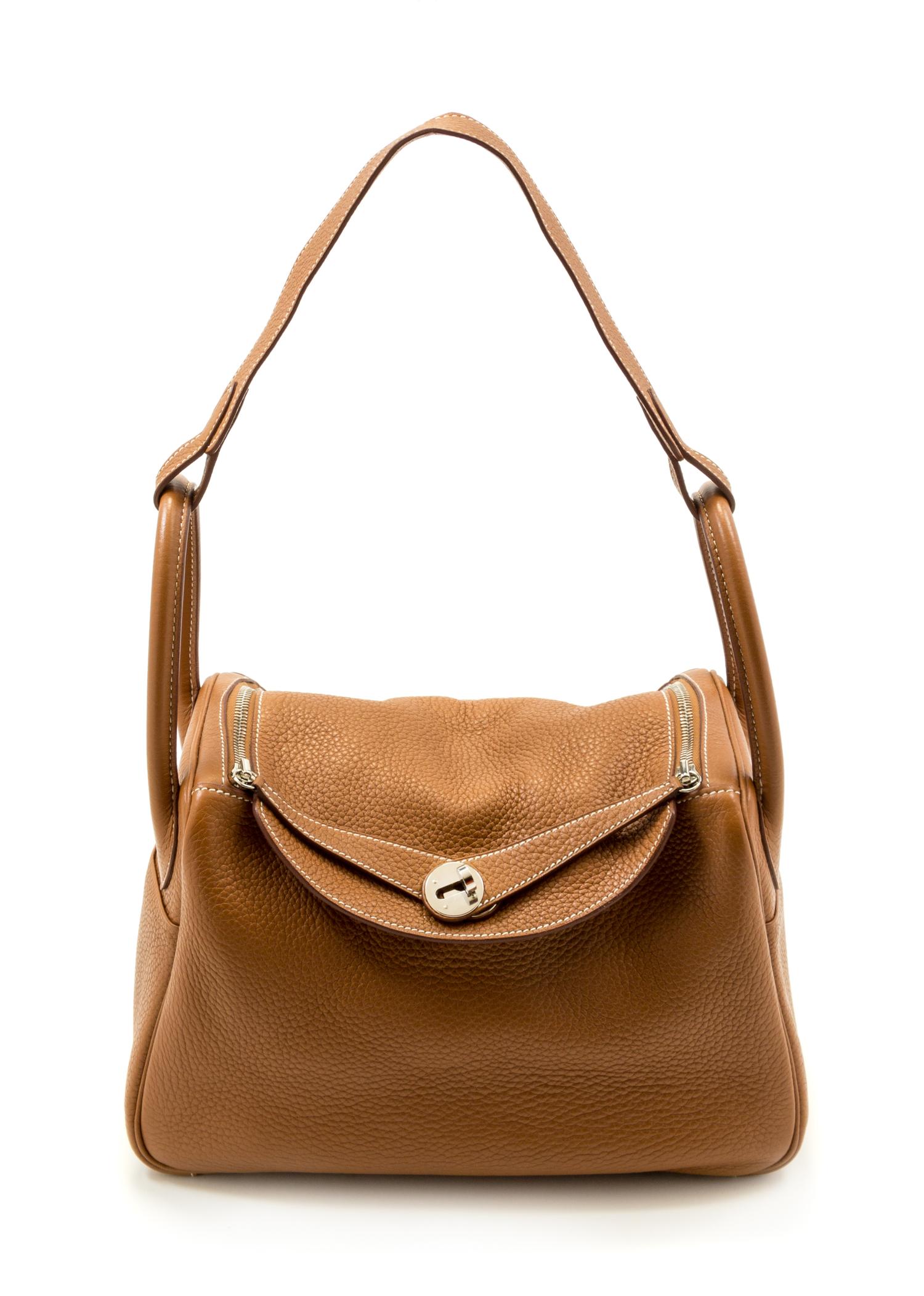 An Hermès Gold Clemence Lindy 30 Handbag, 12" x 7.5" x 6"; Strap drop: 12".