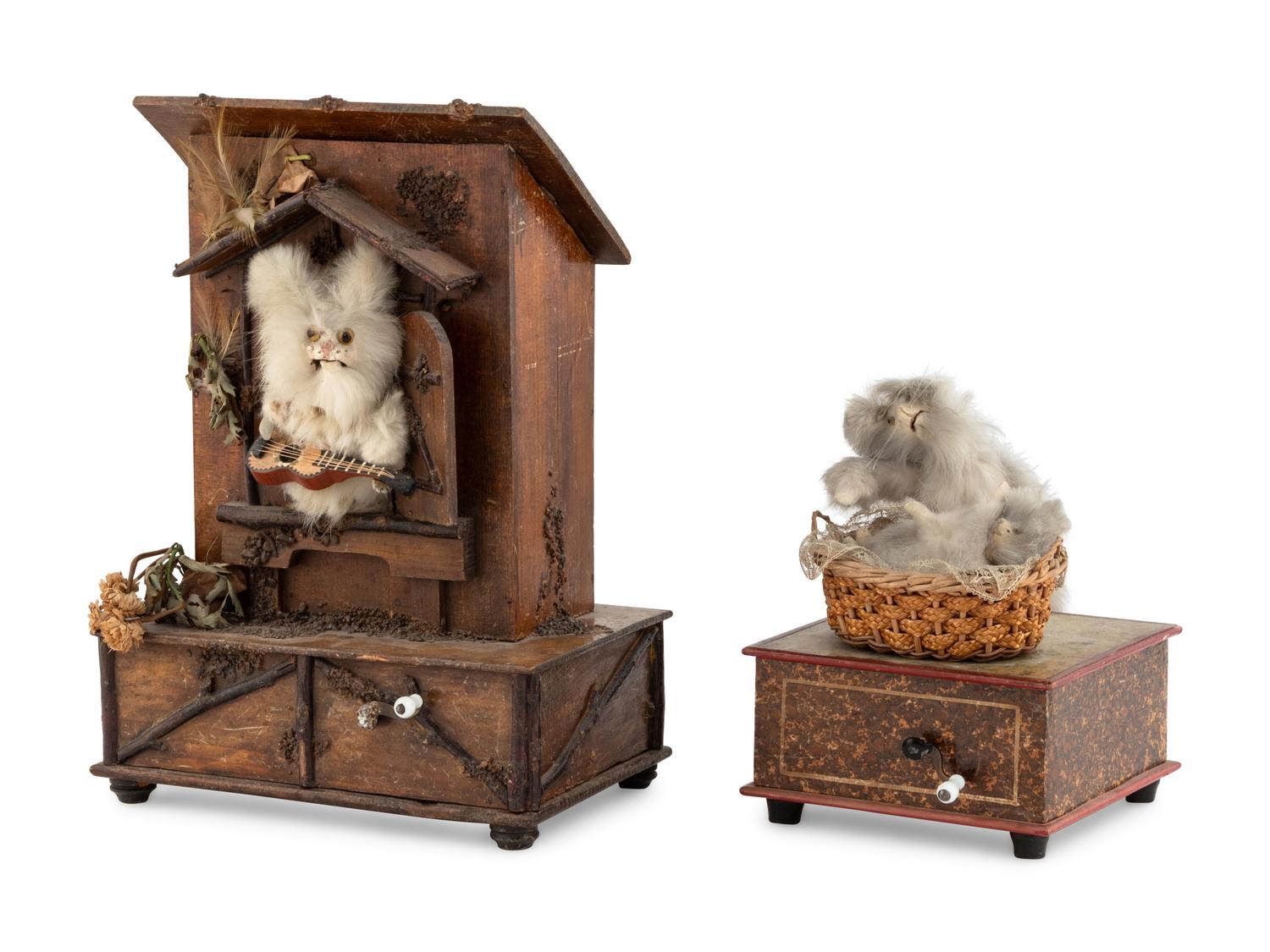 Two Manivelle Automata of Cats