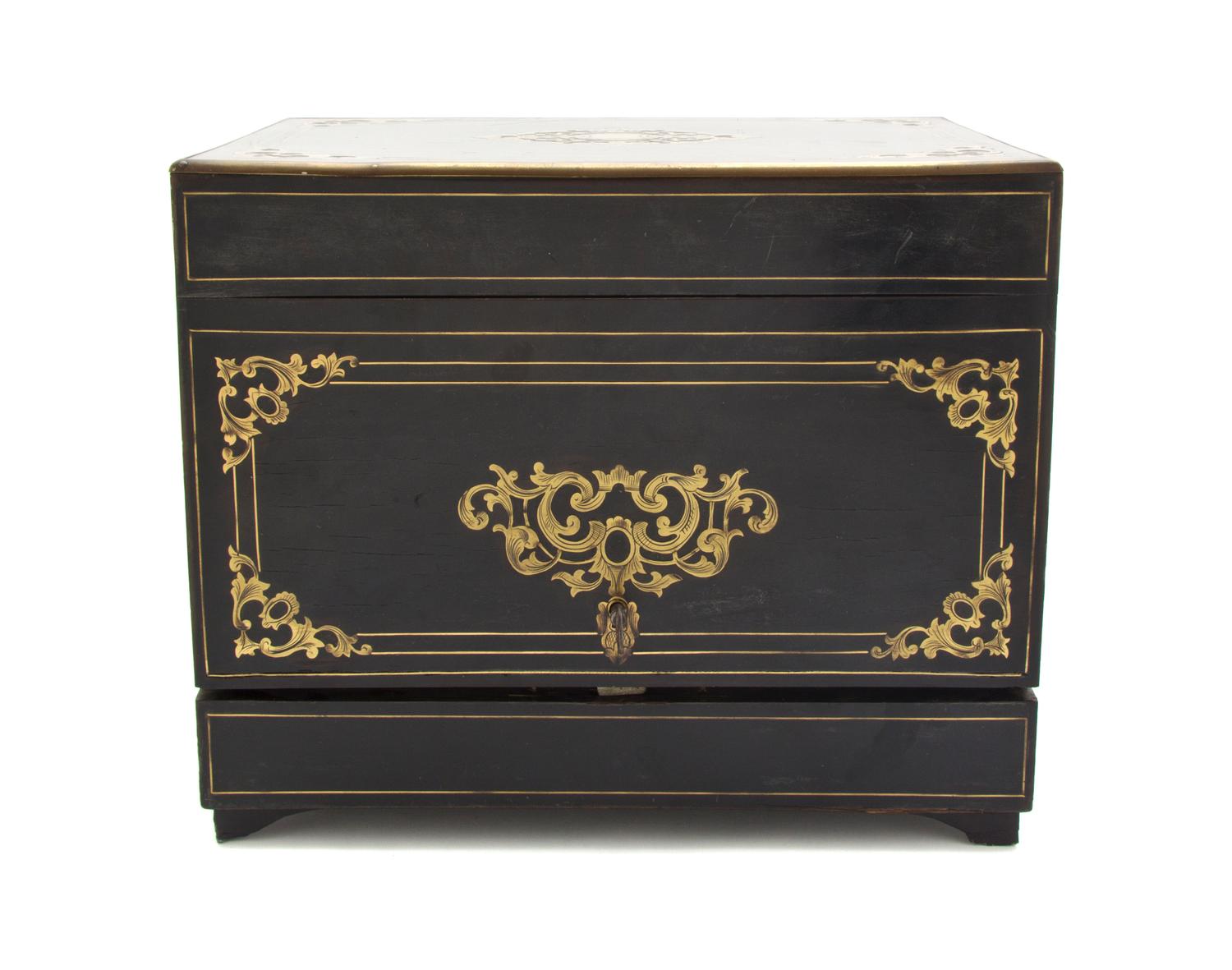 A Continental Ebonized and Brass Inlaid Cave a Liqueur, Height of case 10 3/8 x width 12 3/8 x depth 9 1/2 inches.