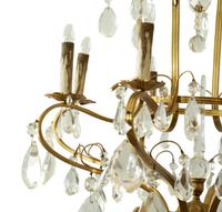 A Louis XV Style Gilt Metal and Cut Glass Six-Light Chandelier