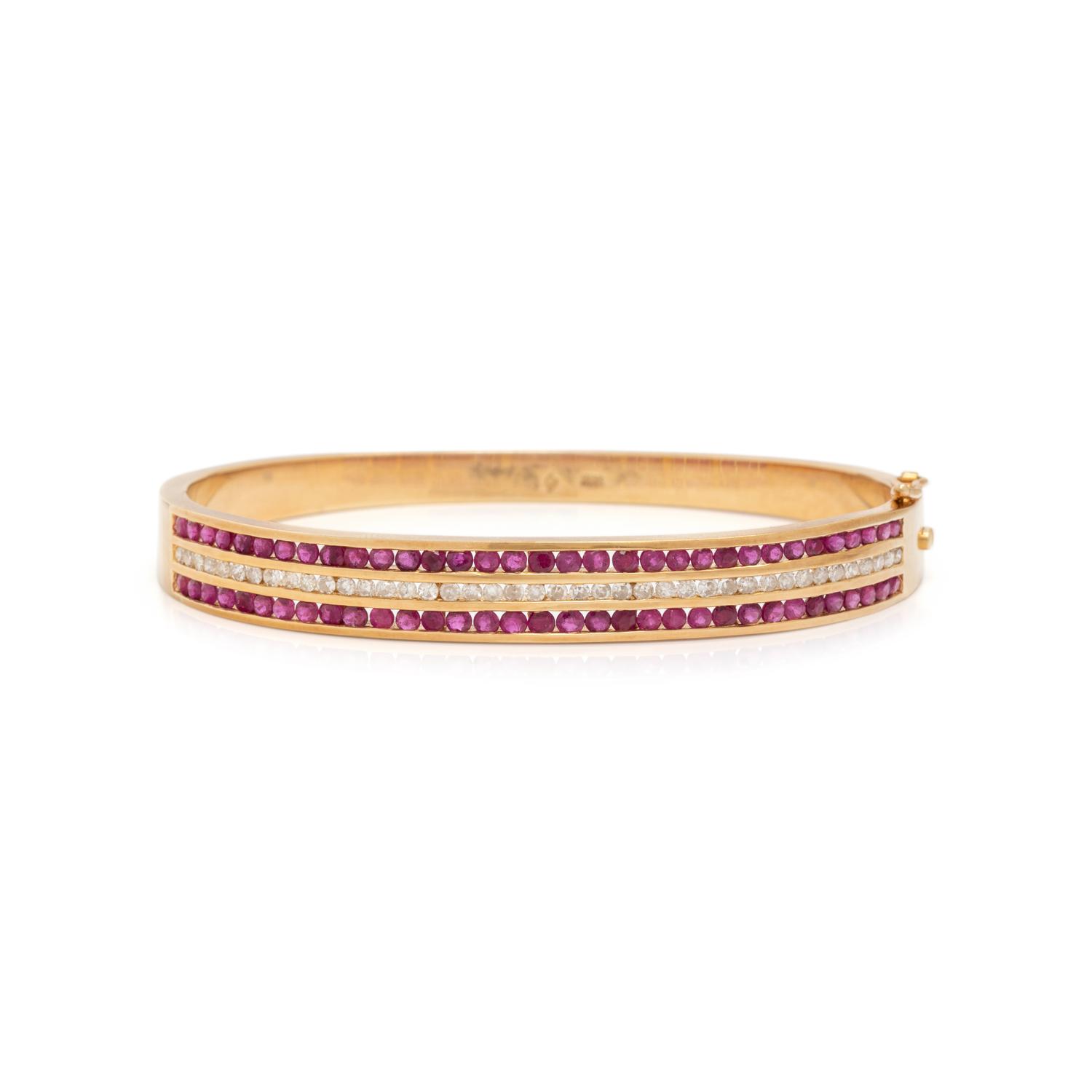 YELLOW GOLD, RUBY AND DIAMOND BANGLE BRACELET