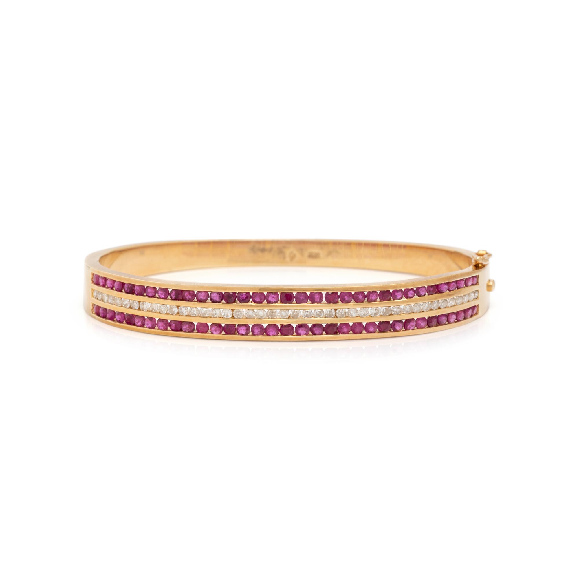 YELLOW GOLD, RUBY AND DIAMOND BANGLE BRACELET