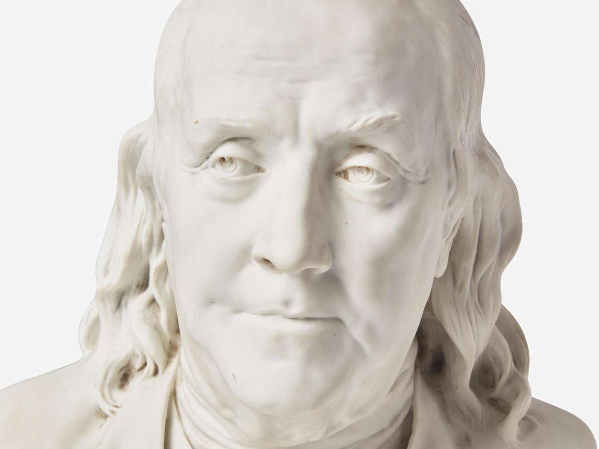 After Jean-Antoine Houdon (French, 1741-1828), Parian bust of Benjamin Franklin (1706-1790), marked Sevres, early 20th century