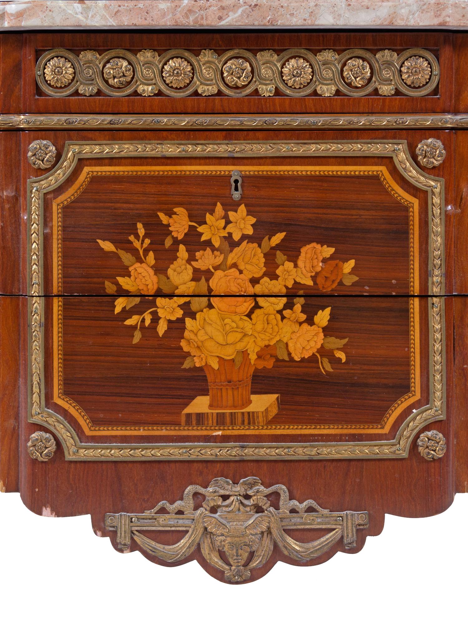 A Transitional Style Gilt Bronze Mounted Marquetry Commode