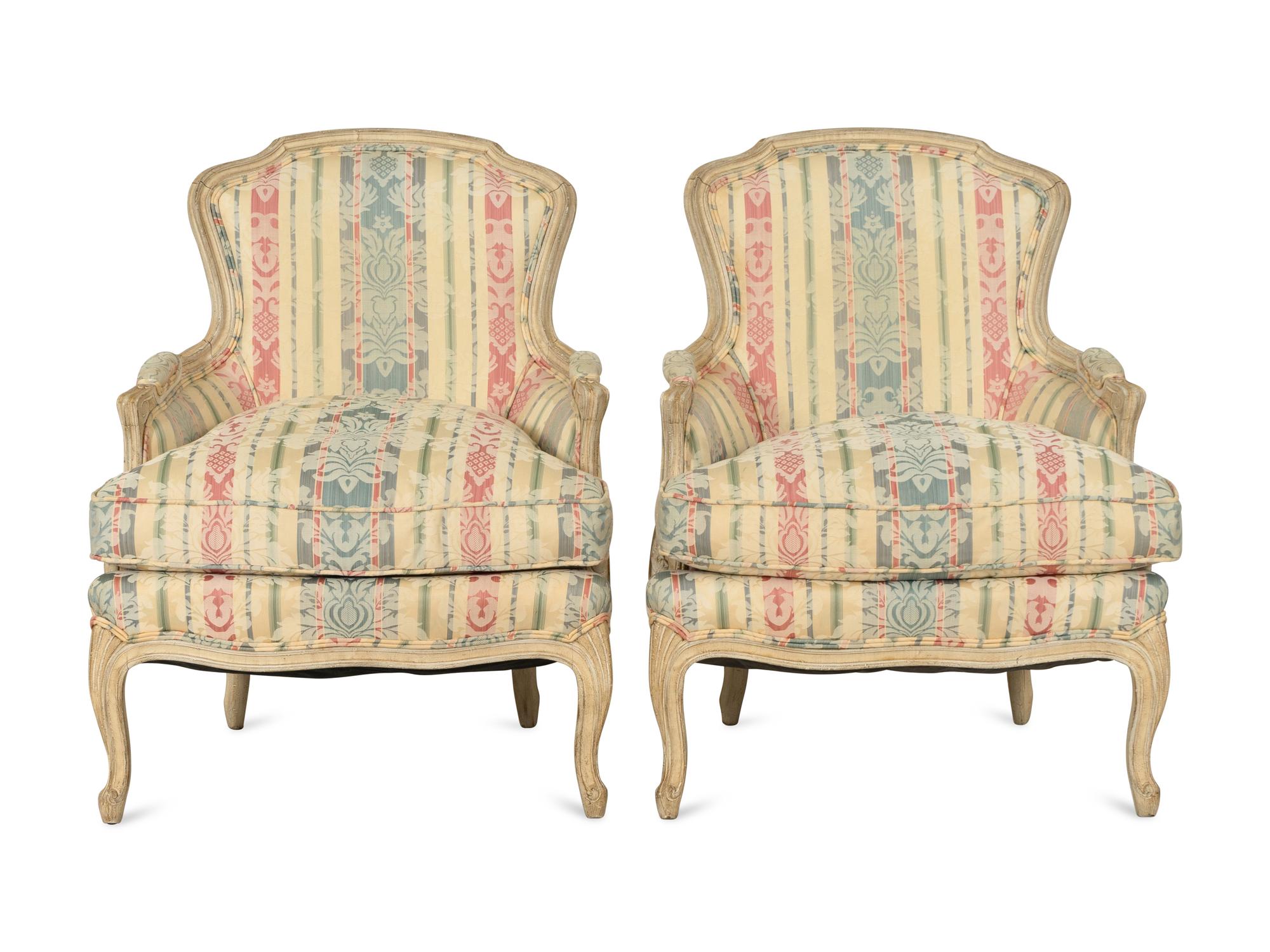 A Pair of Louis XV Style Cream-Painted Bergères