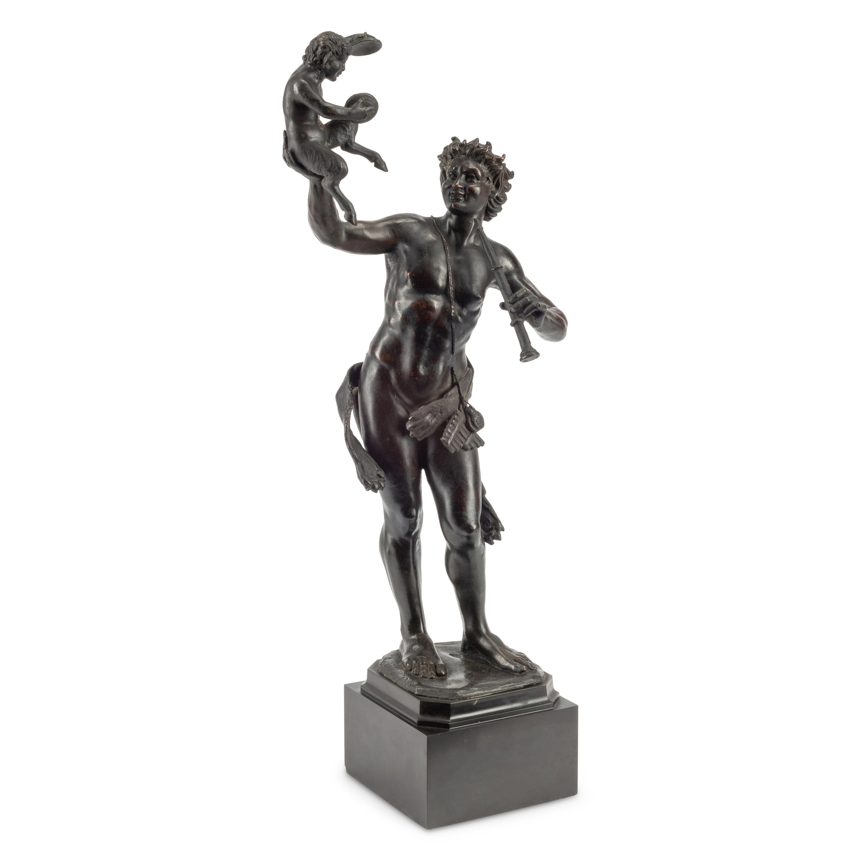 A Patinated Bronze Figure of Pan with a Faun