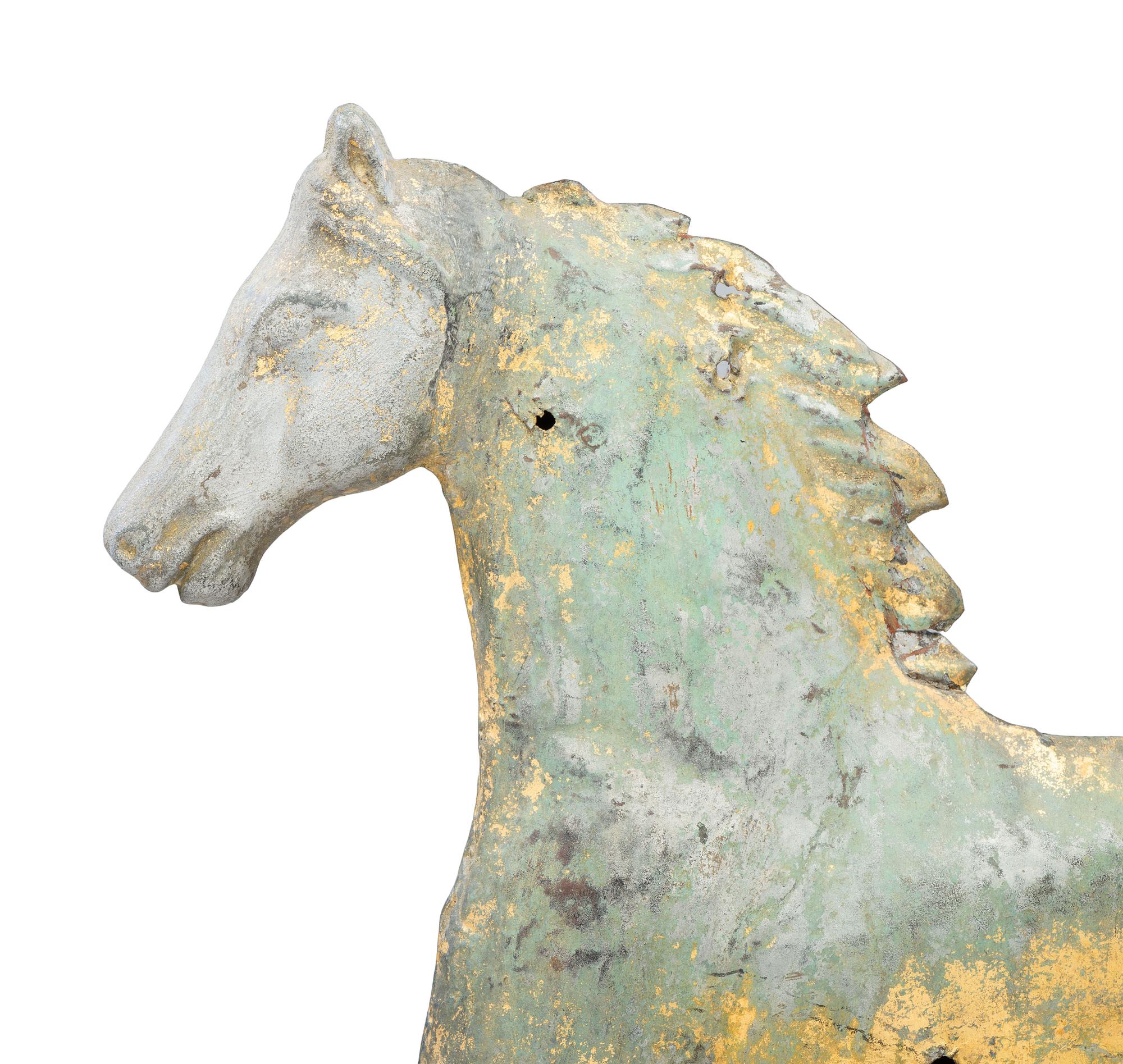 A Cast Zinc and Parcel Gilt Molded Copper Trotting Horse Weathervane