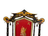 A Set of Four Black and Polychrome Chinoiserie-Decorated Chairs